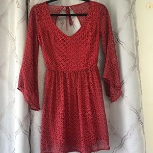 Backless long sleeve dress.